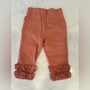 Ruffle Butts coral orange ruffle bottoms